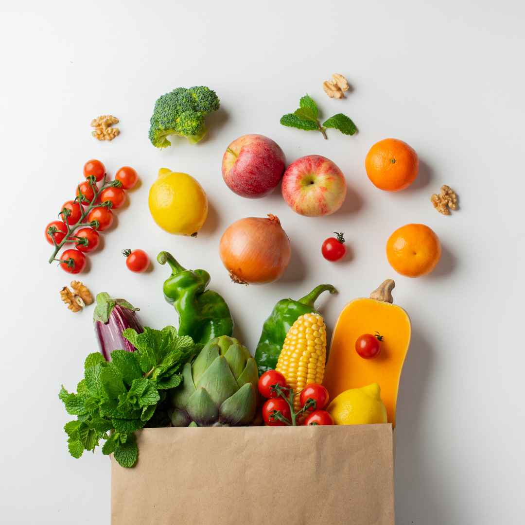 Paper bag with healthy fruits and vegetables