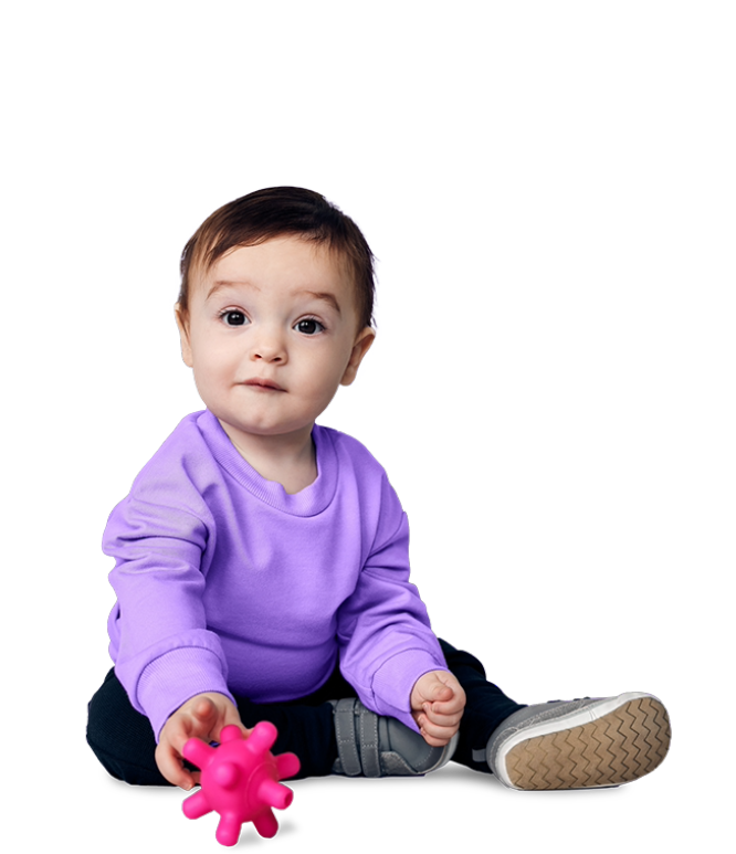 Infant with pink toy